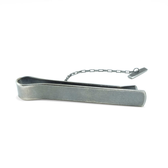 Sterling silver tie bar in black oxidized finish.